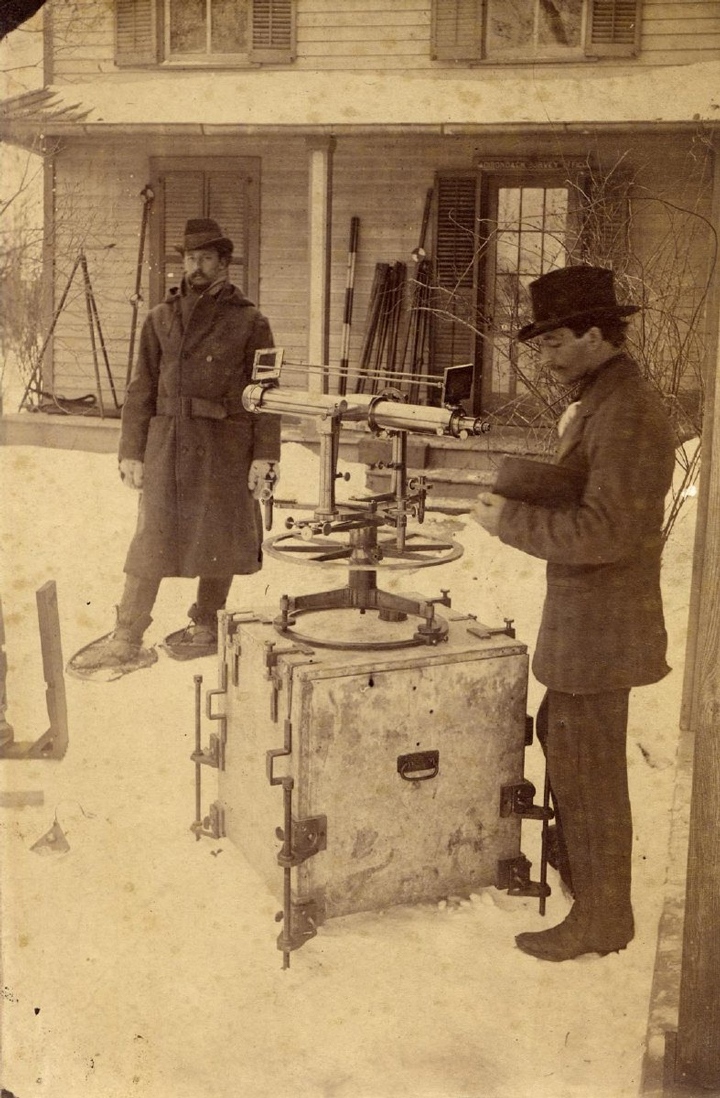 Verplanck Colvin and Mills Blake examining surveying equipment, c. 1880. ( P008247)